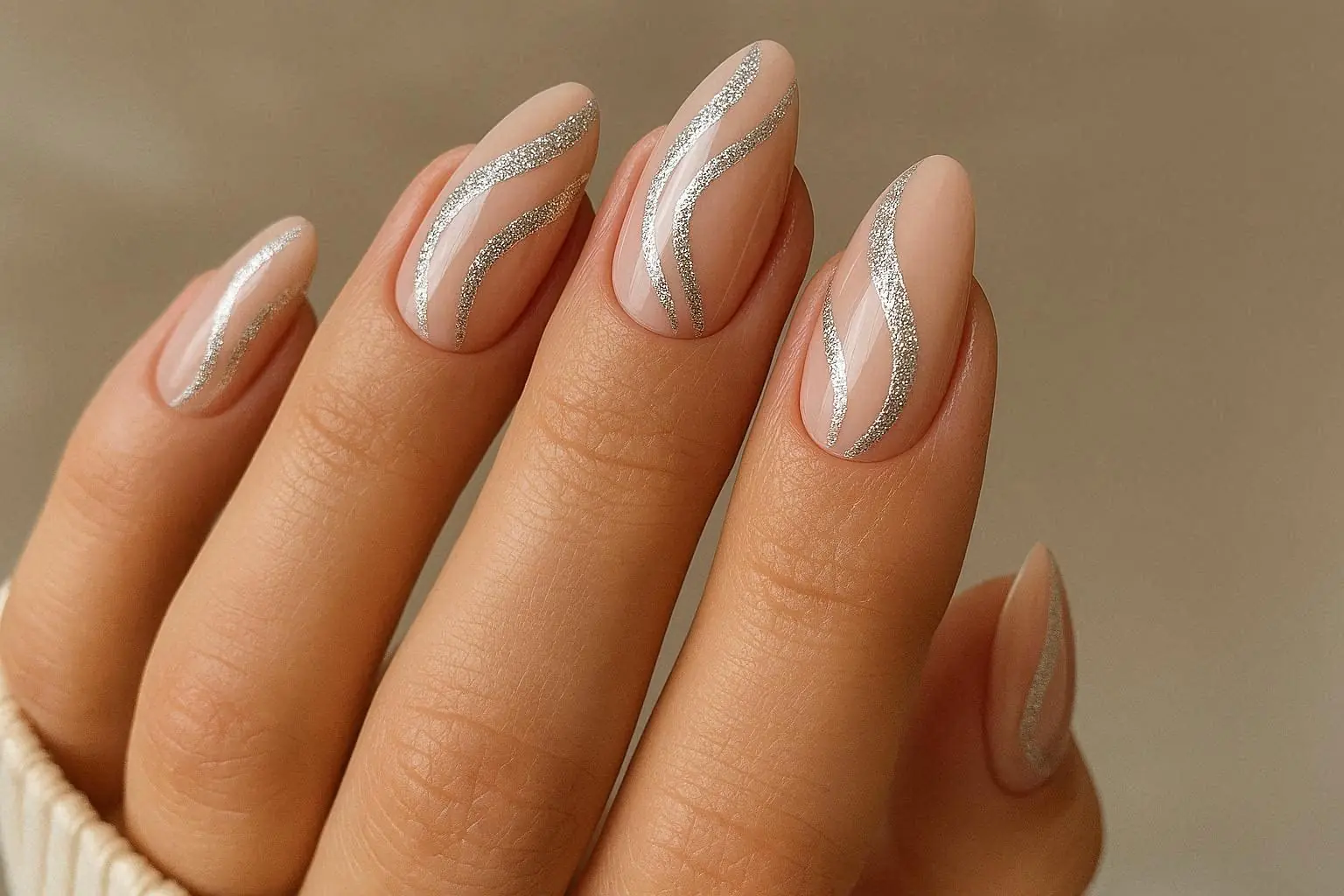 Elegant Nude & Silver Glitter Swirl Nails Sophisticated Almond Nail Art Ideas
